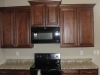 Staggered cabinets w/crown molding